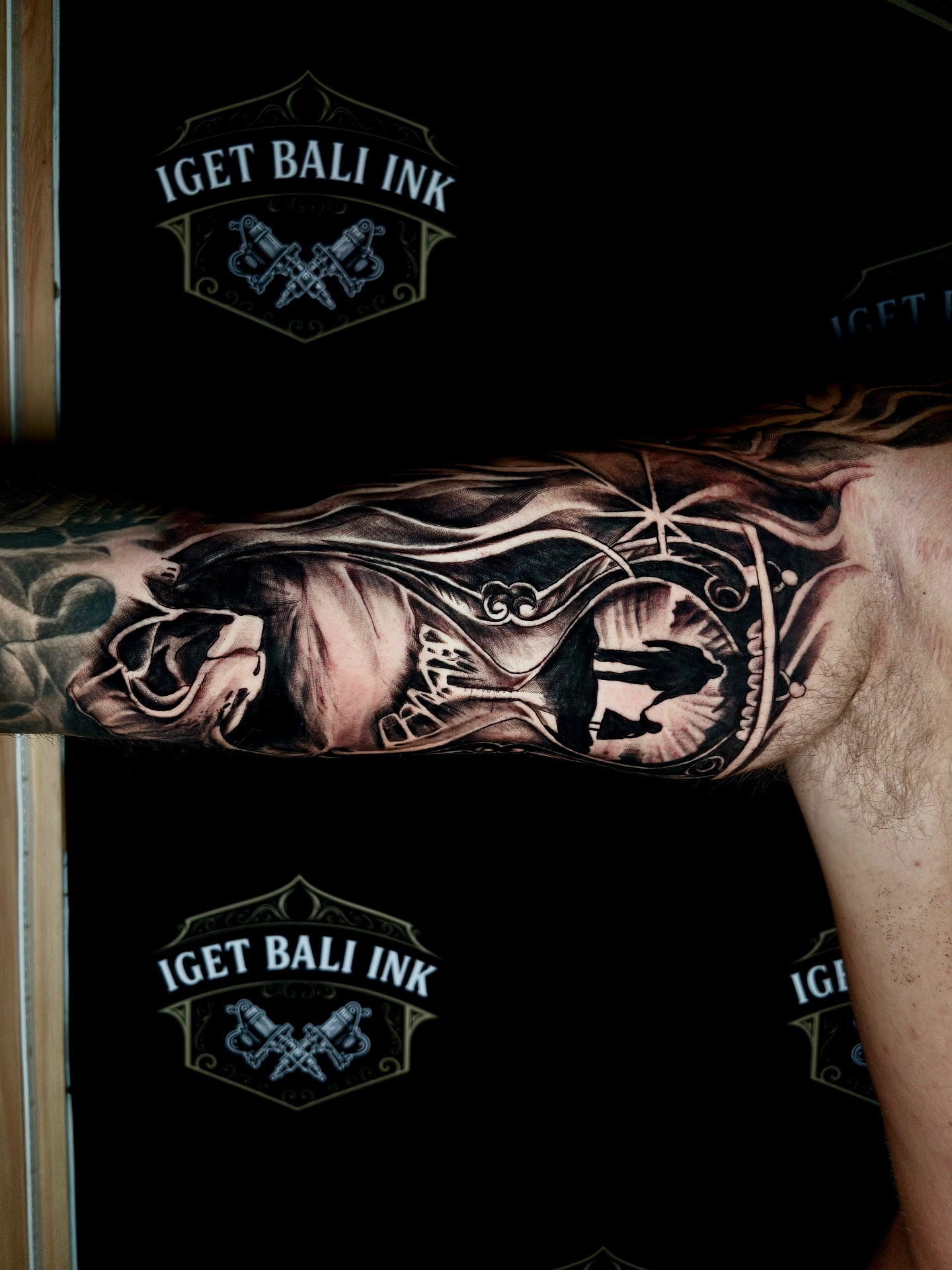 Black and grey grim reaper and clock inner arm tattoo