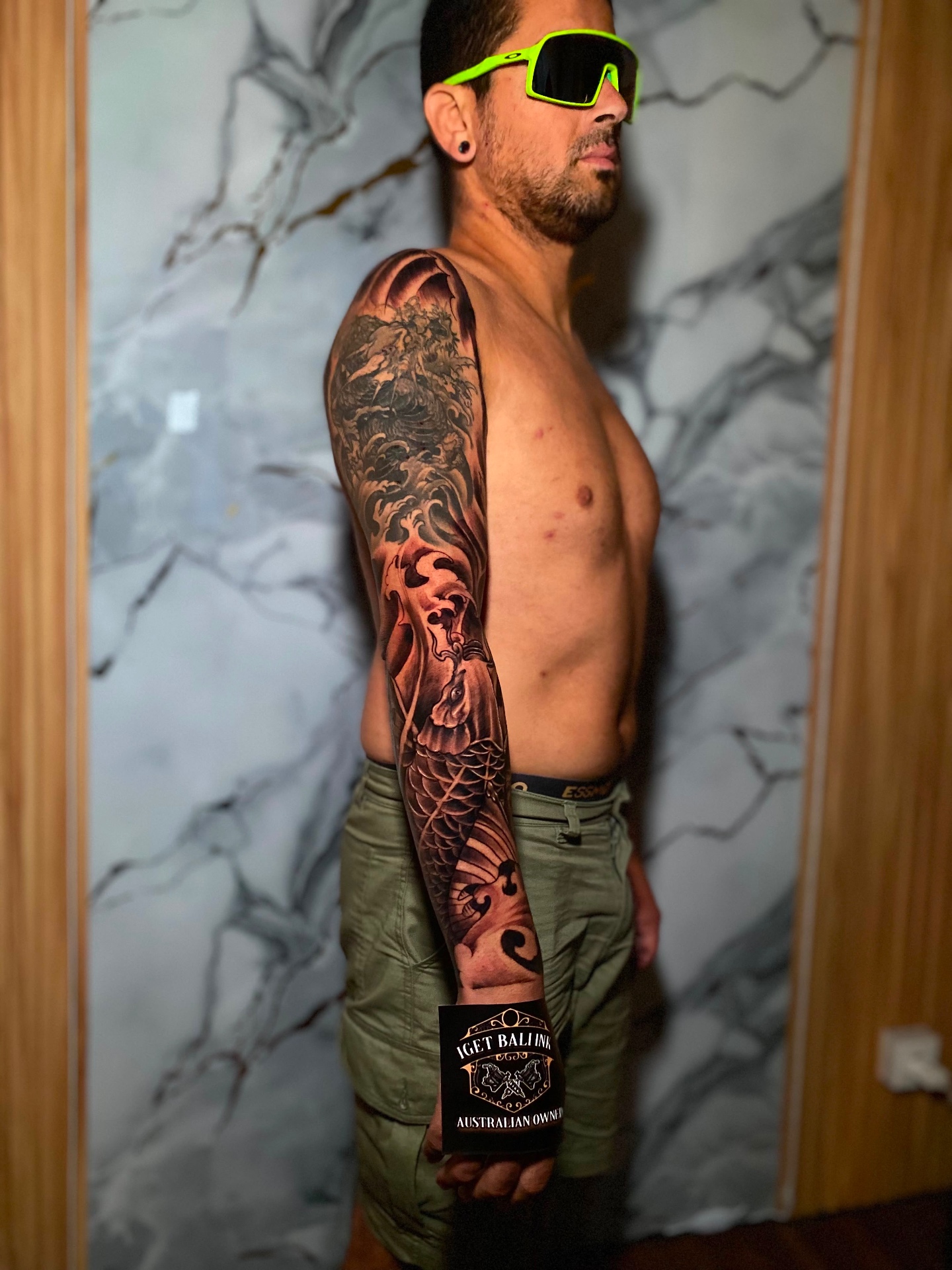 Balinese Barong and koi half sleeve with cherry blossom