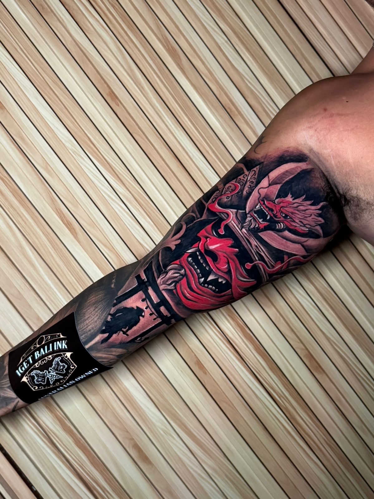 Red hannya mask and samurai leg sleeve