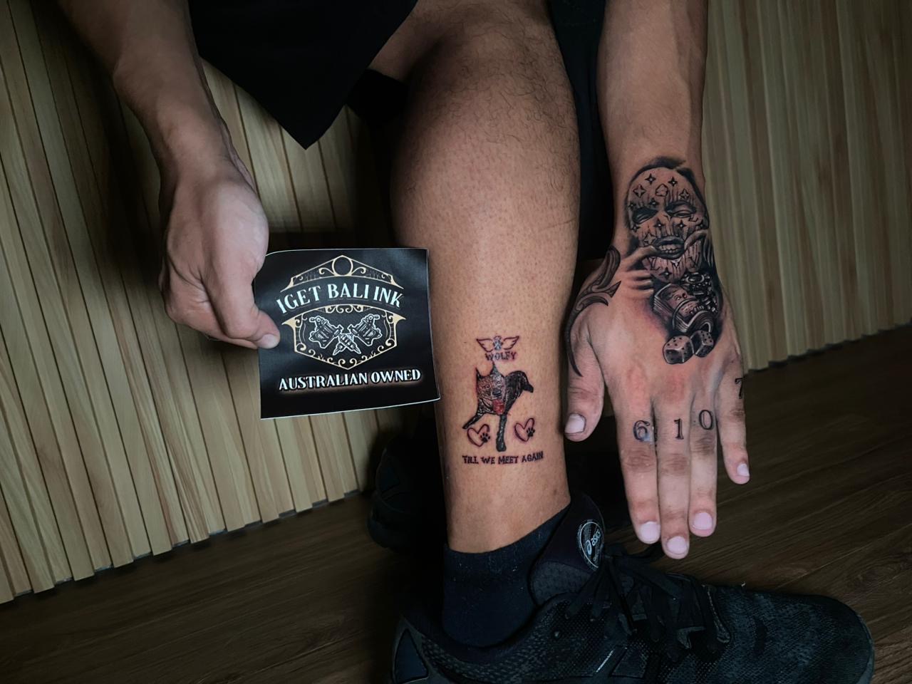 Fine line dog memorial tattoo with hand numbers