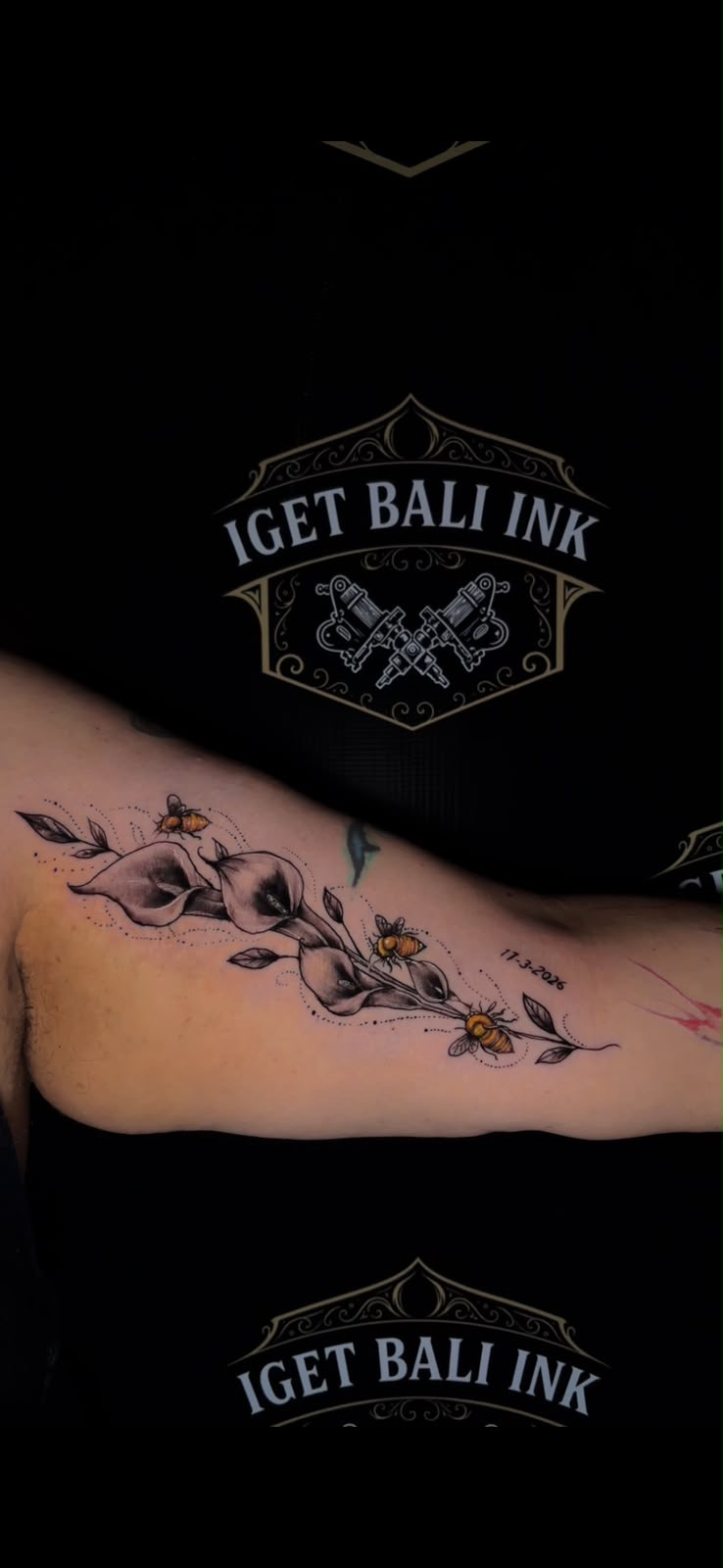 Calla lilies with colour bees inner arm tattoo