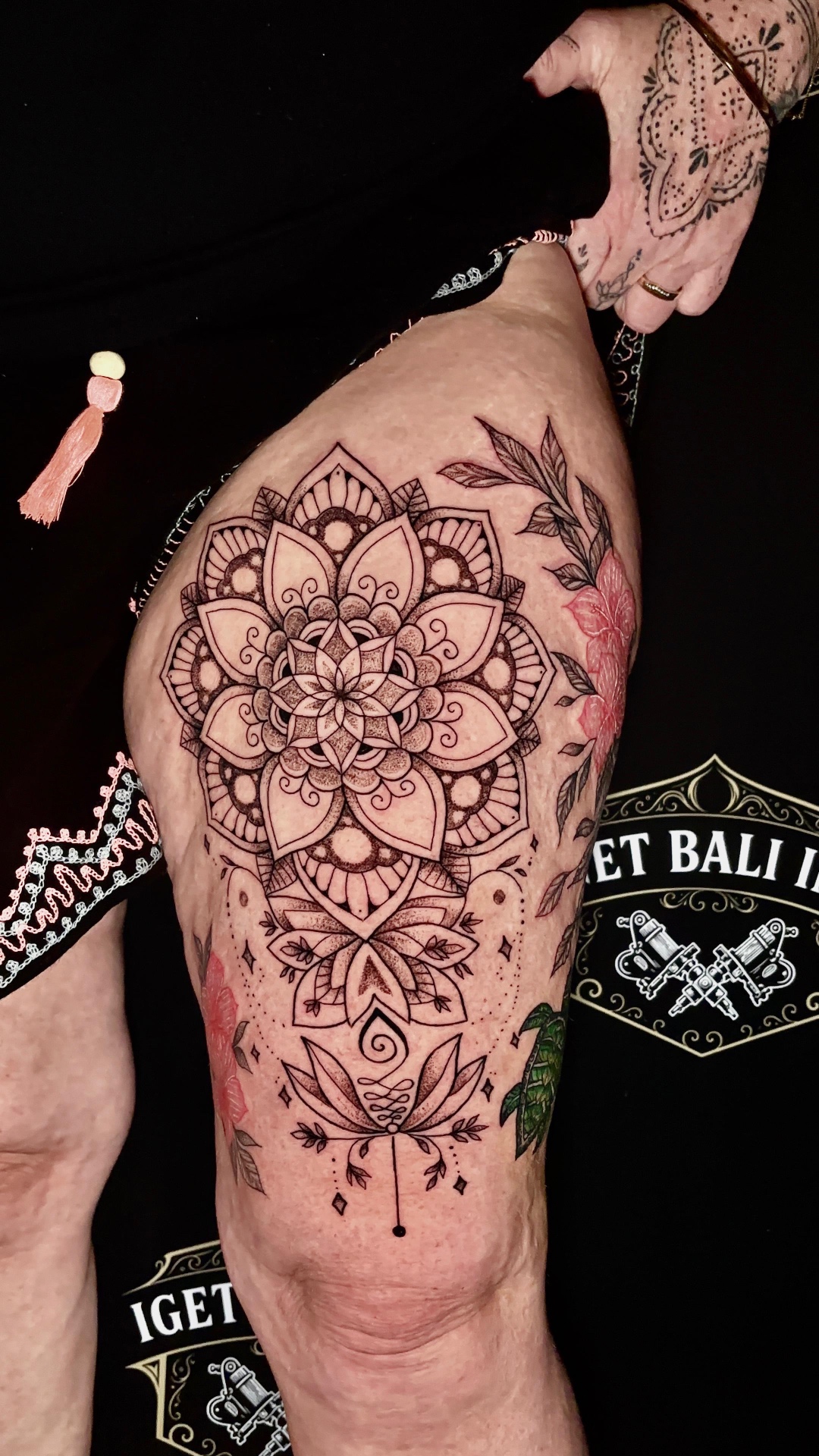 Fine line mandala and lotus hip tattoo