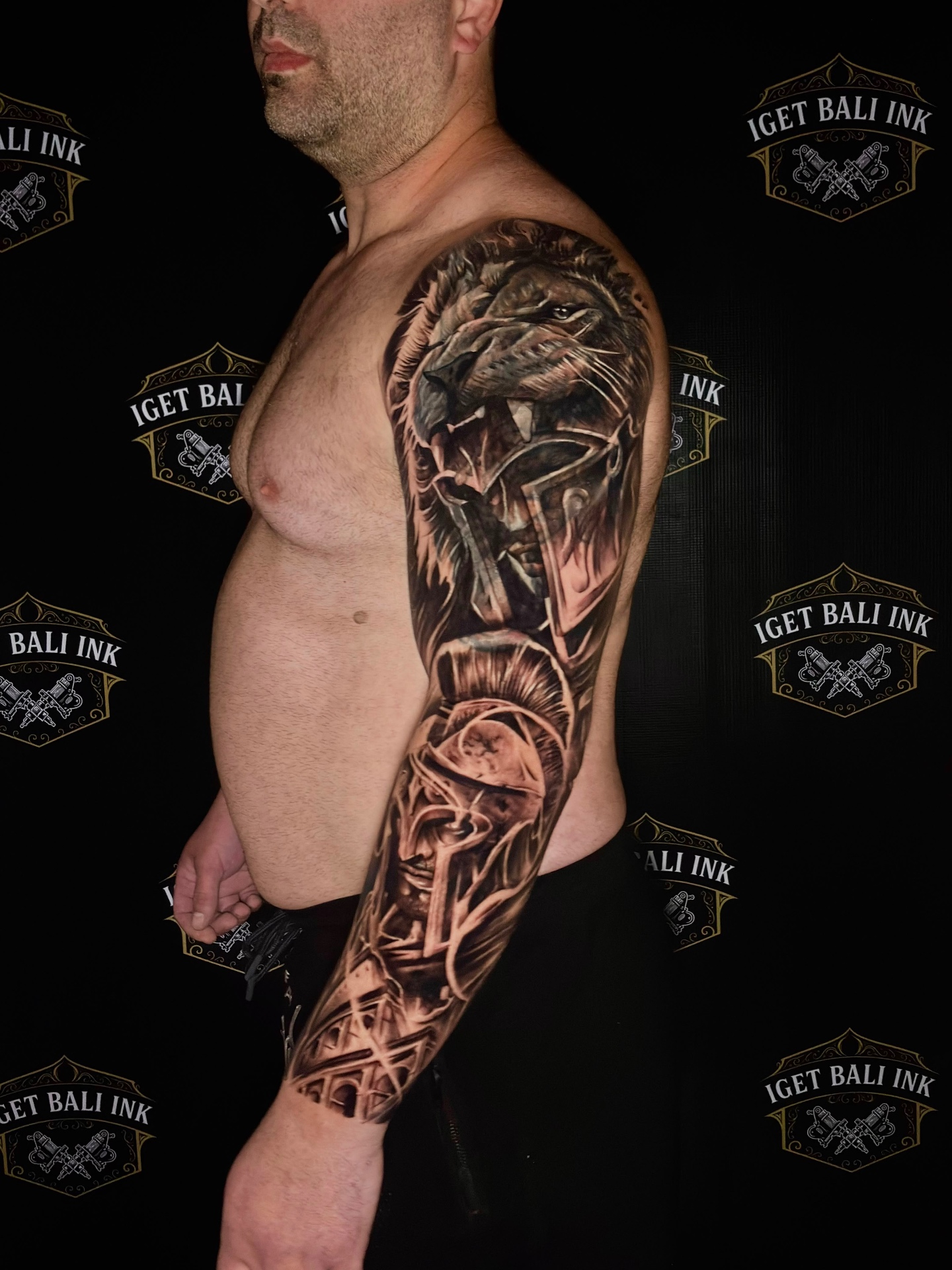 Lion and Spartan warrior full sleeve in black and grey realism