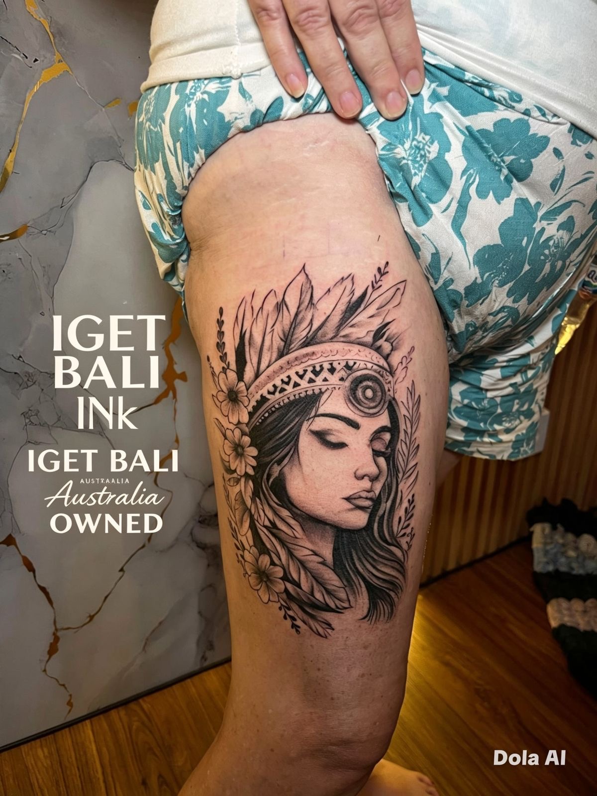 Black and grey portrait with headdress and florals on the thigh