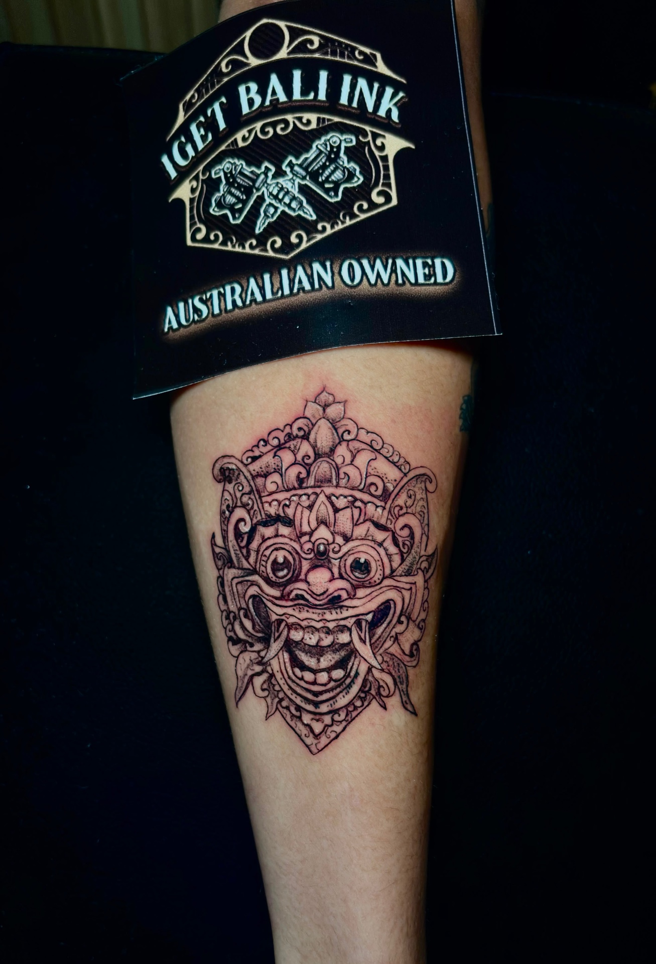 Balinese Barong mask dotwork tattoo on the calf