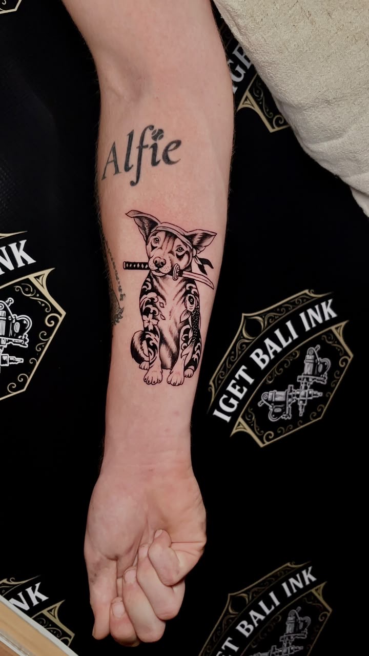 Fine line samurai dog tattoo on the forearm