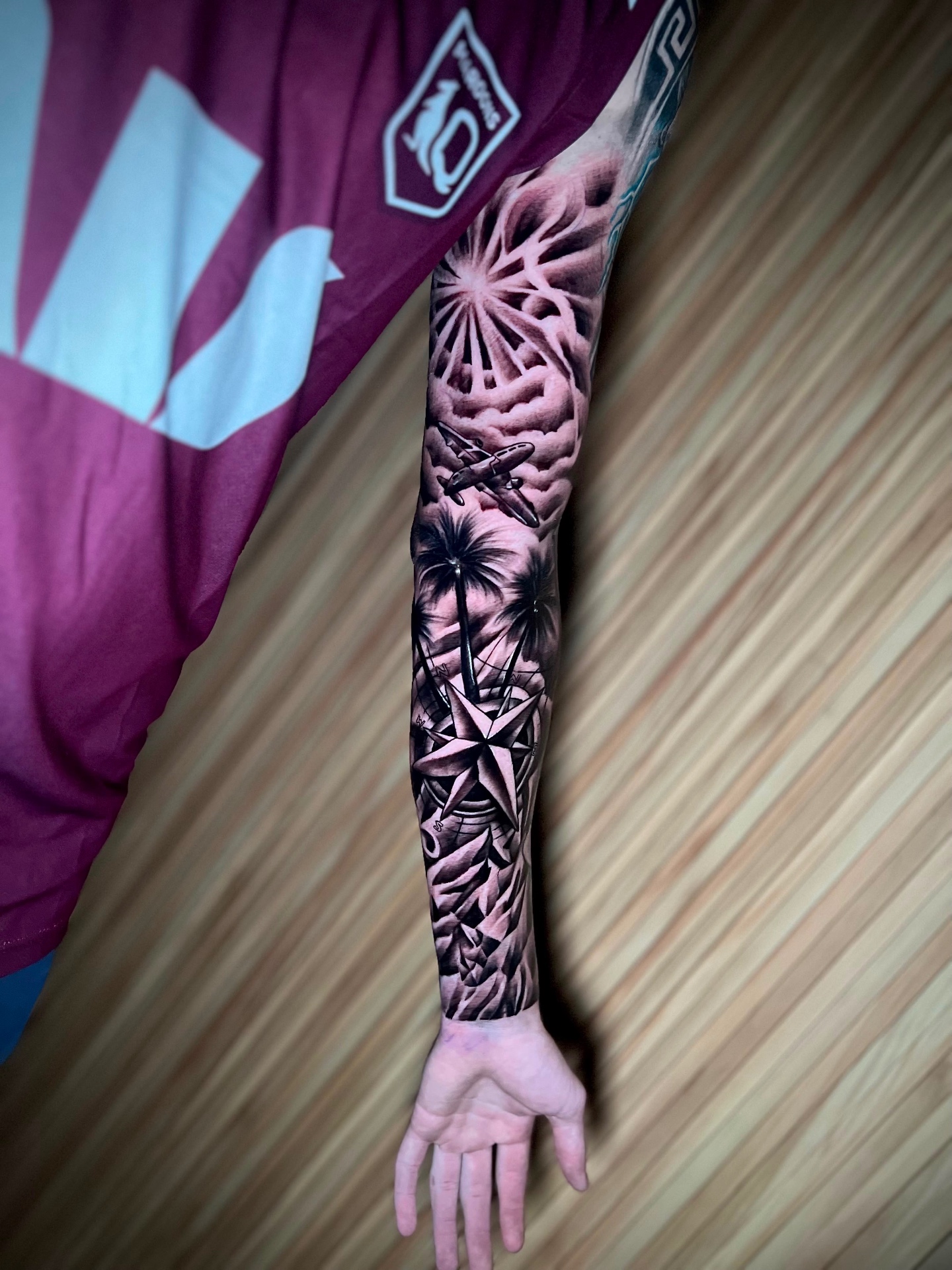 Black and grey compass, palms and aircraft full sleeve