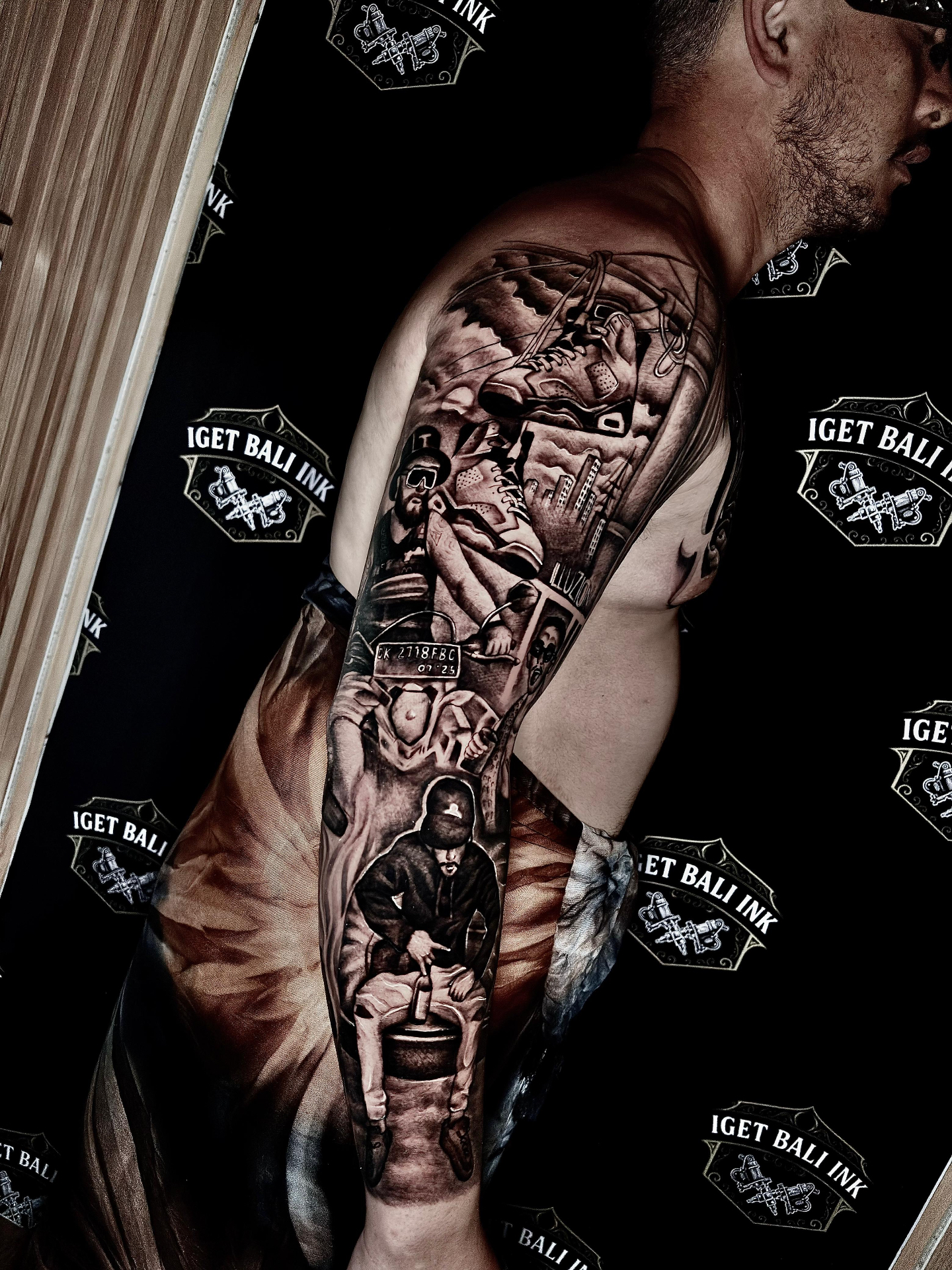 Black and grey hip hop themed full sleeve with sneakers and city