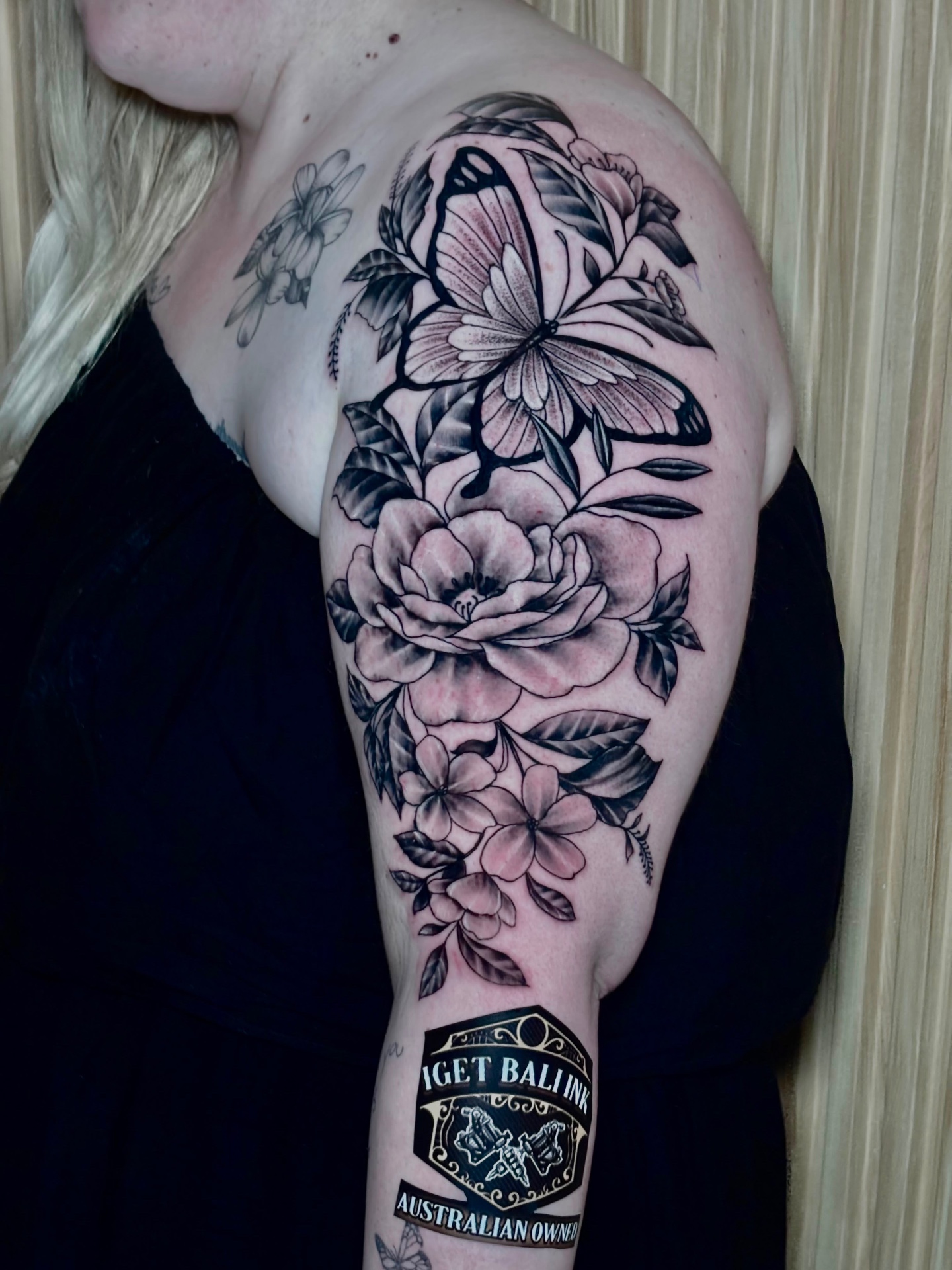 Black and grey butterfly and floral half sleeve