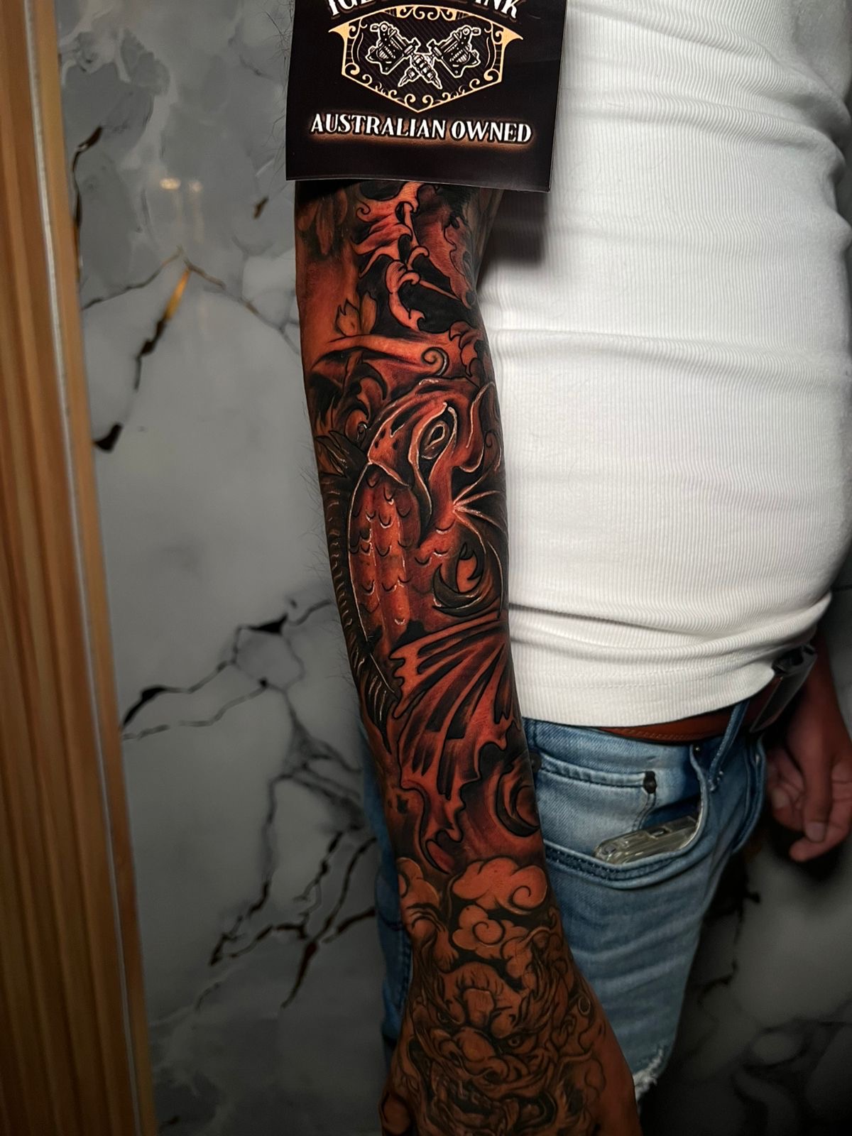 Japanese koi and foo dog full arm sleeve in black and grey