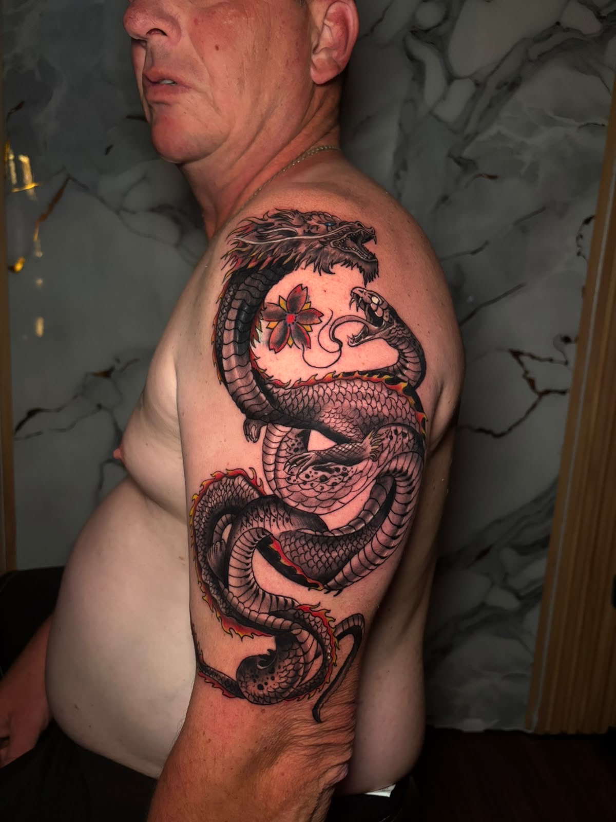 Japanese dragon and snake half sleeve with cherry blossom
