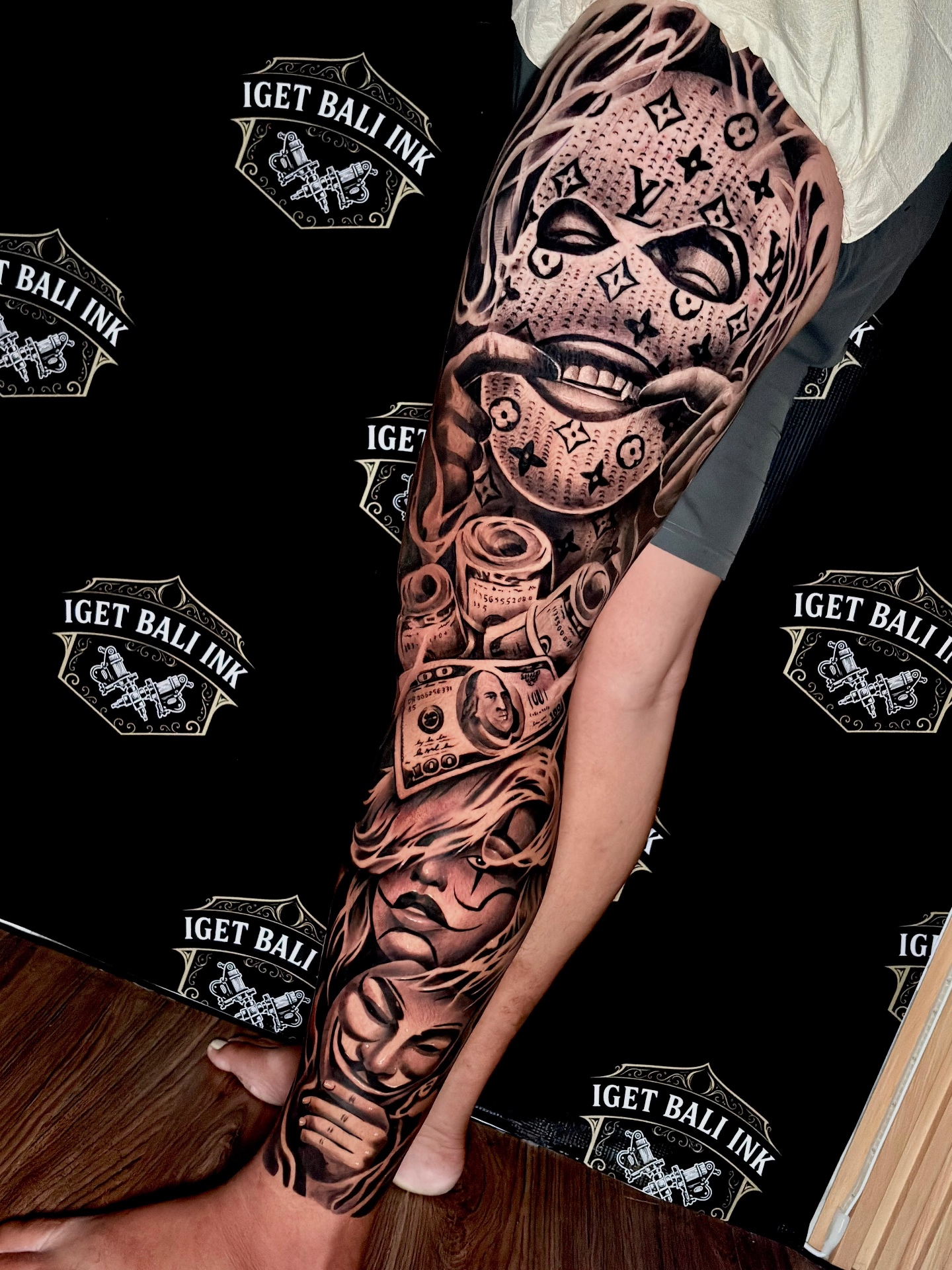 Black and grey masked figure and money full leg sleeve