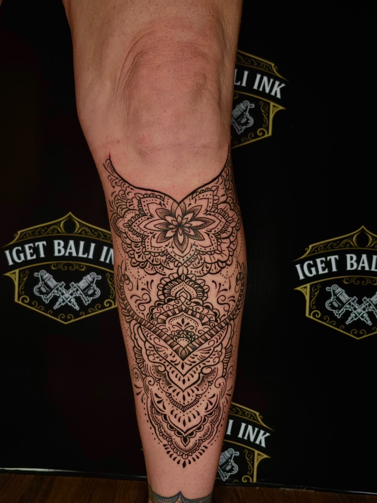 Mandala dotwork ornamental calf tattoo