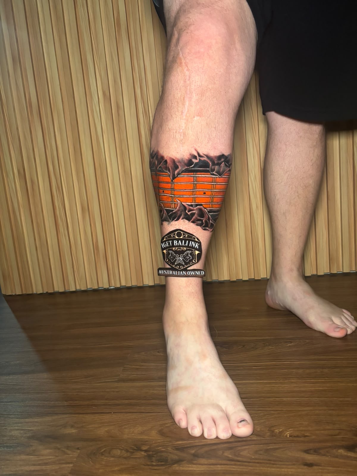 Orange guitar fretboard calf band with torn skin effect