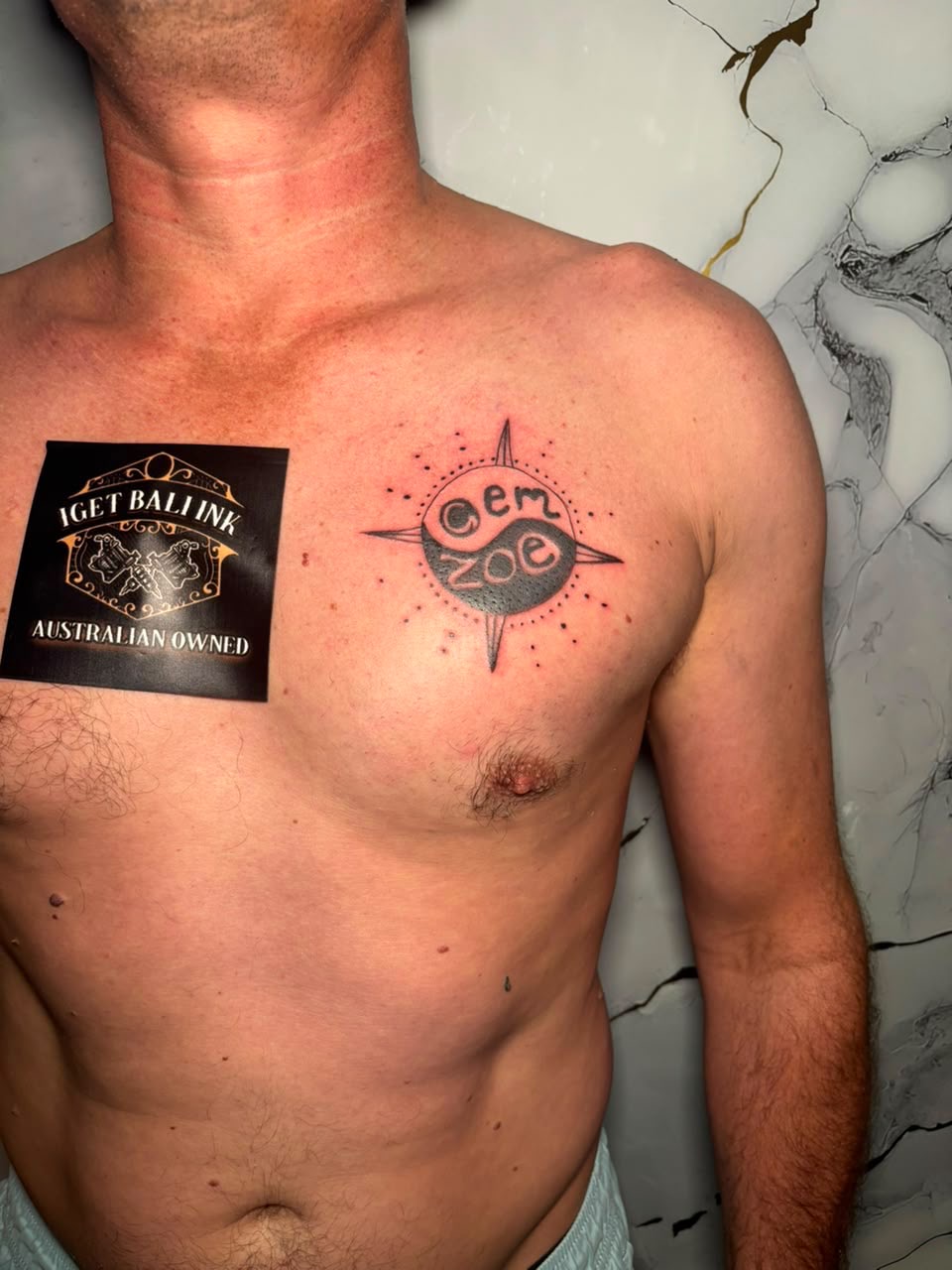 Compass and yin yang chest piece with Em and Zoe lettering